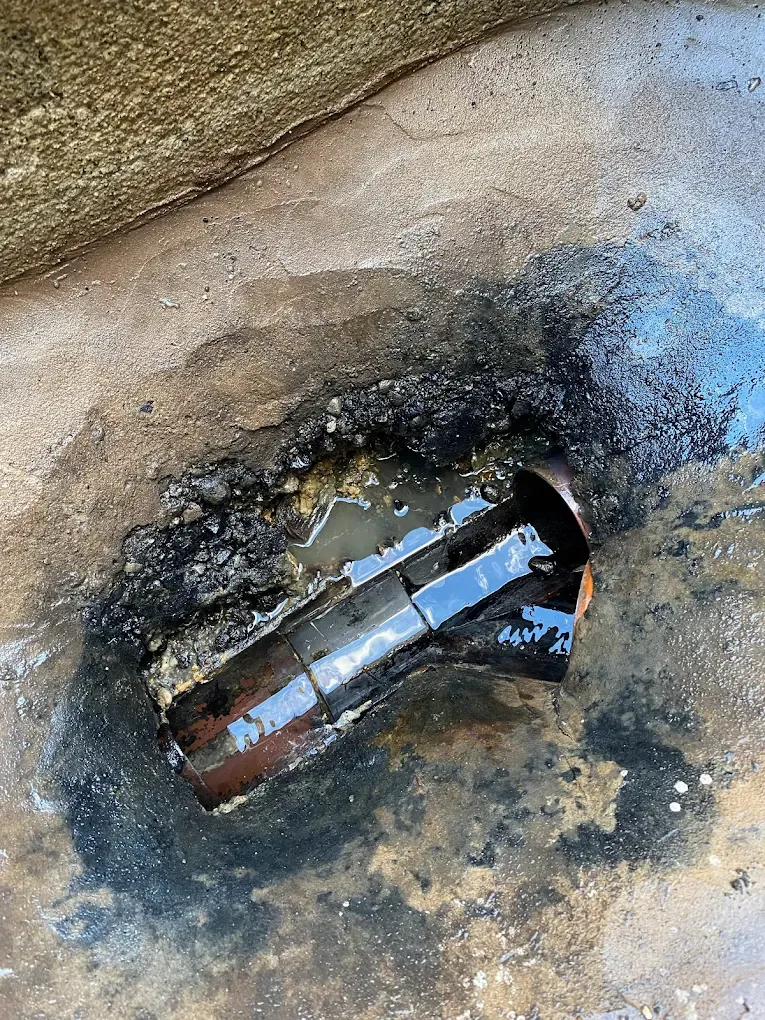 Image showing a blocked drain with standing water and sludge